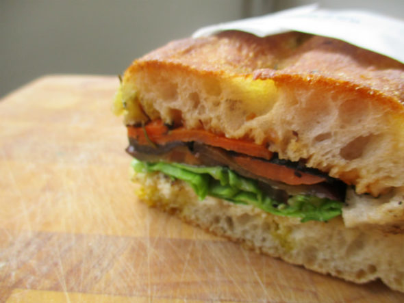 A vegetarian sandwich in Italian focaccia bread