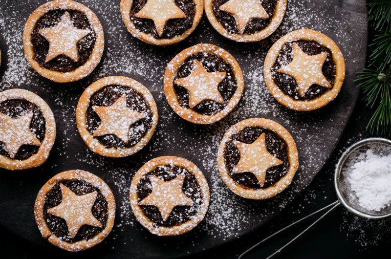 xmas_pies_WEB A swag of Christmas Mince Pies with star-cut pastry on top, dusted in icing sugar
